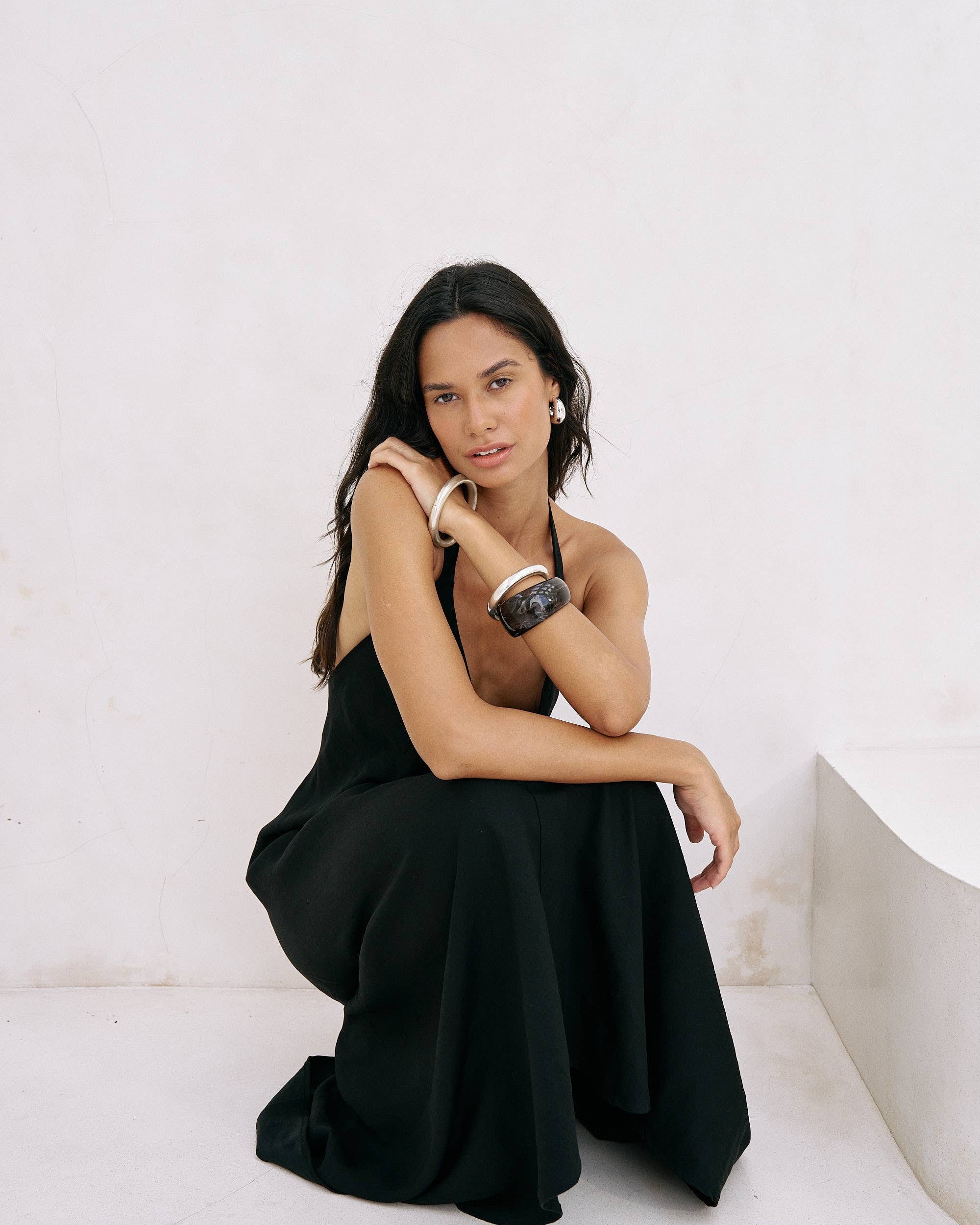 Zoe Maxi Dress: sleeveless white dress with square neckline, fitted bodice, and flowing ankle-length skirt