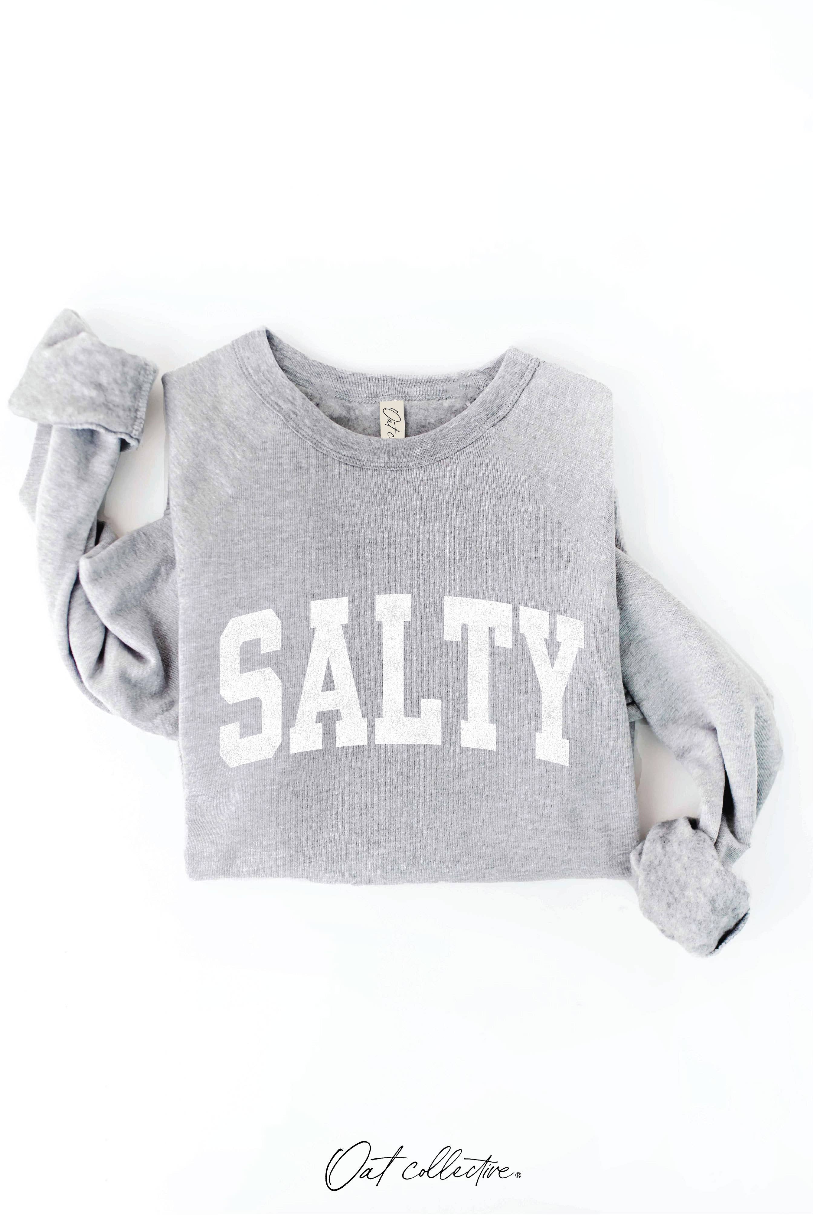SALTY Graphic Sweatshirt: boxy fit, white crewneck with long sleeves and ribbed hem and cuffs