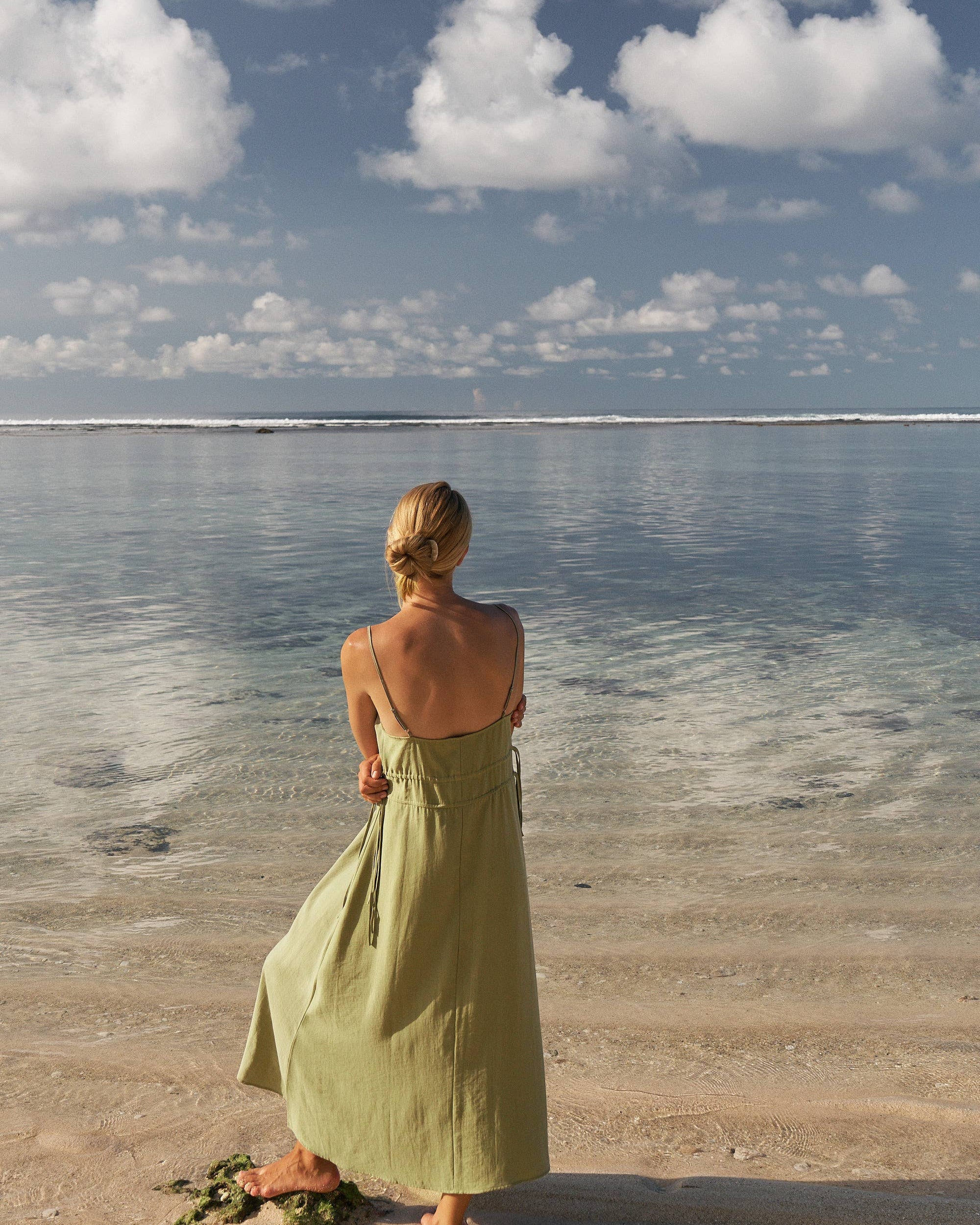 Sofia Ties Maxi Dress: sleeveless beige dress with V-neck, fitted waist, and flowing ankle-length hem