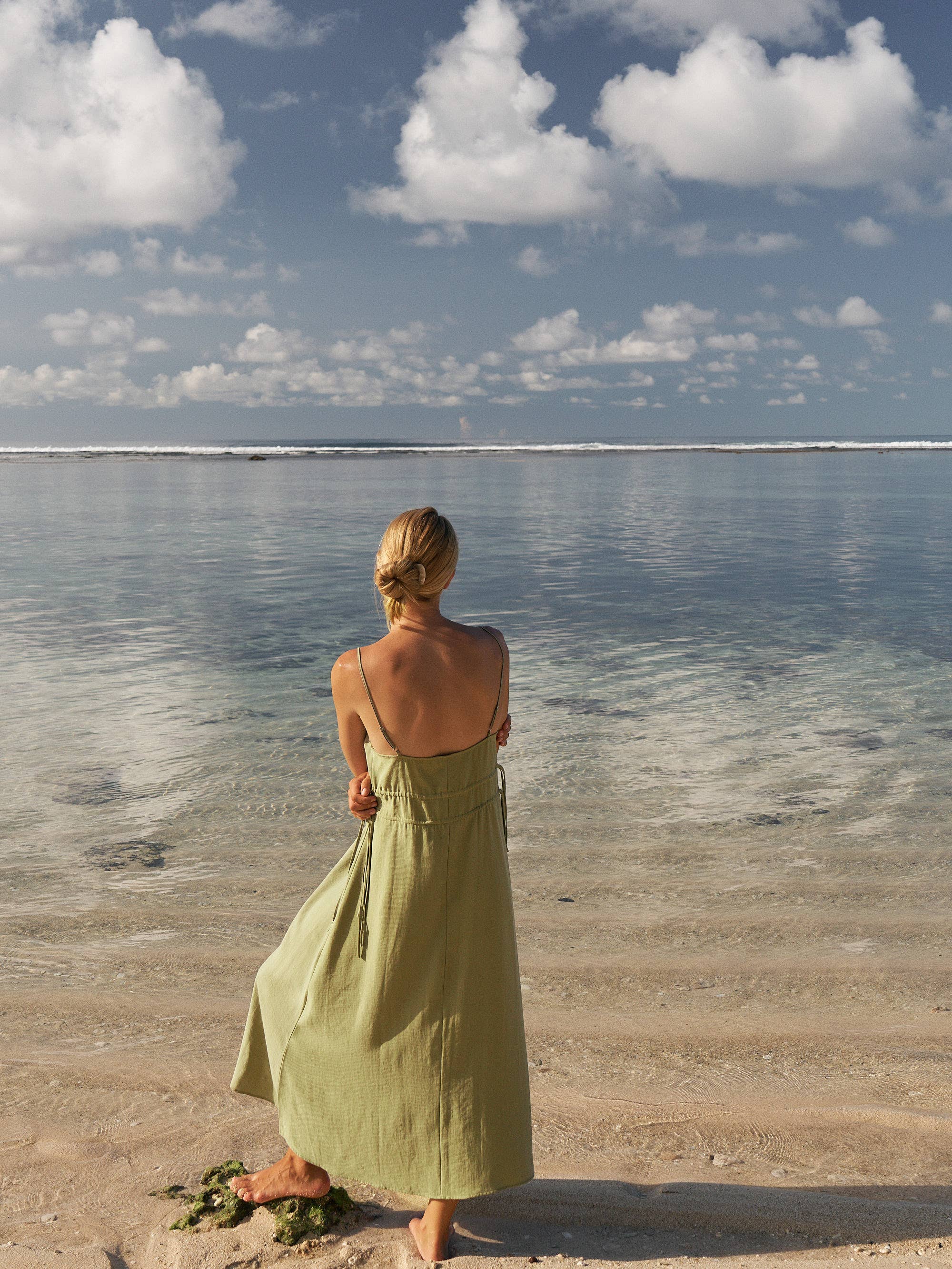 Sofia Ties Maxi Dress: sleeveless beige dress with V-neck, fitted waist, and flowing ankle-length hem