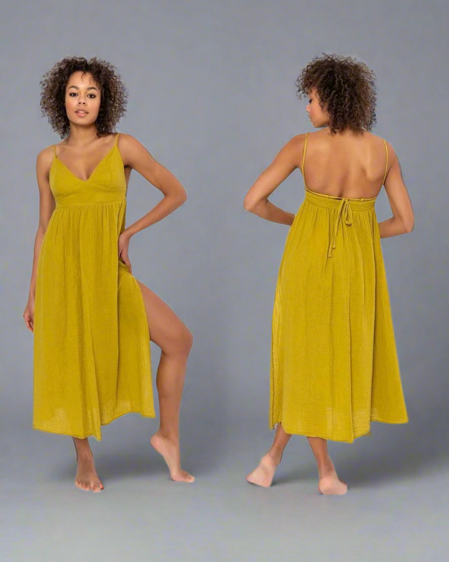 Lydia Dress: sleeveless midi dress in light beige with V-neckline and draped waist detail