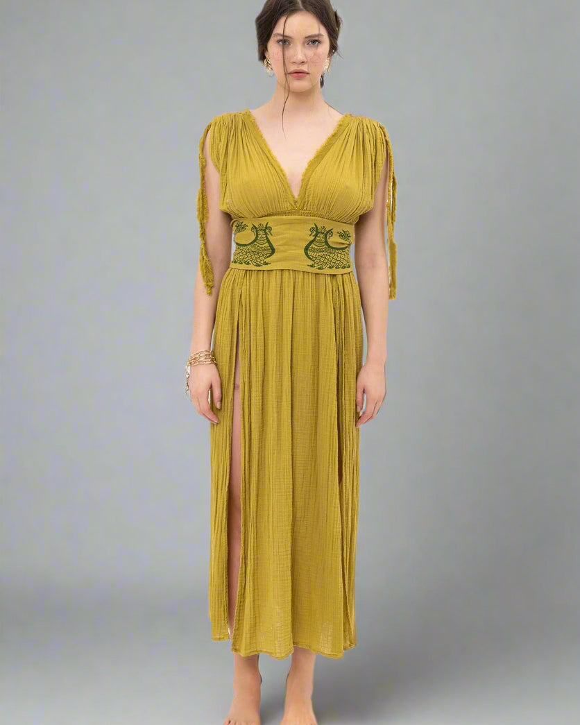 Shahmaran Dress: sleeveless white dress with square neckline, fitted bodice, and midi hem