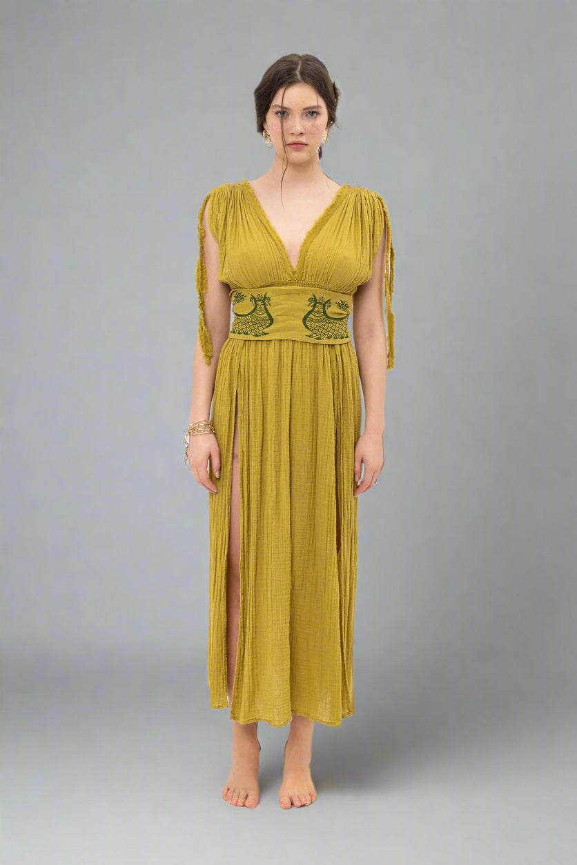 Shahmaran Dress: sleeveless white dress with square neckline, fitted bodice, and midi hem