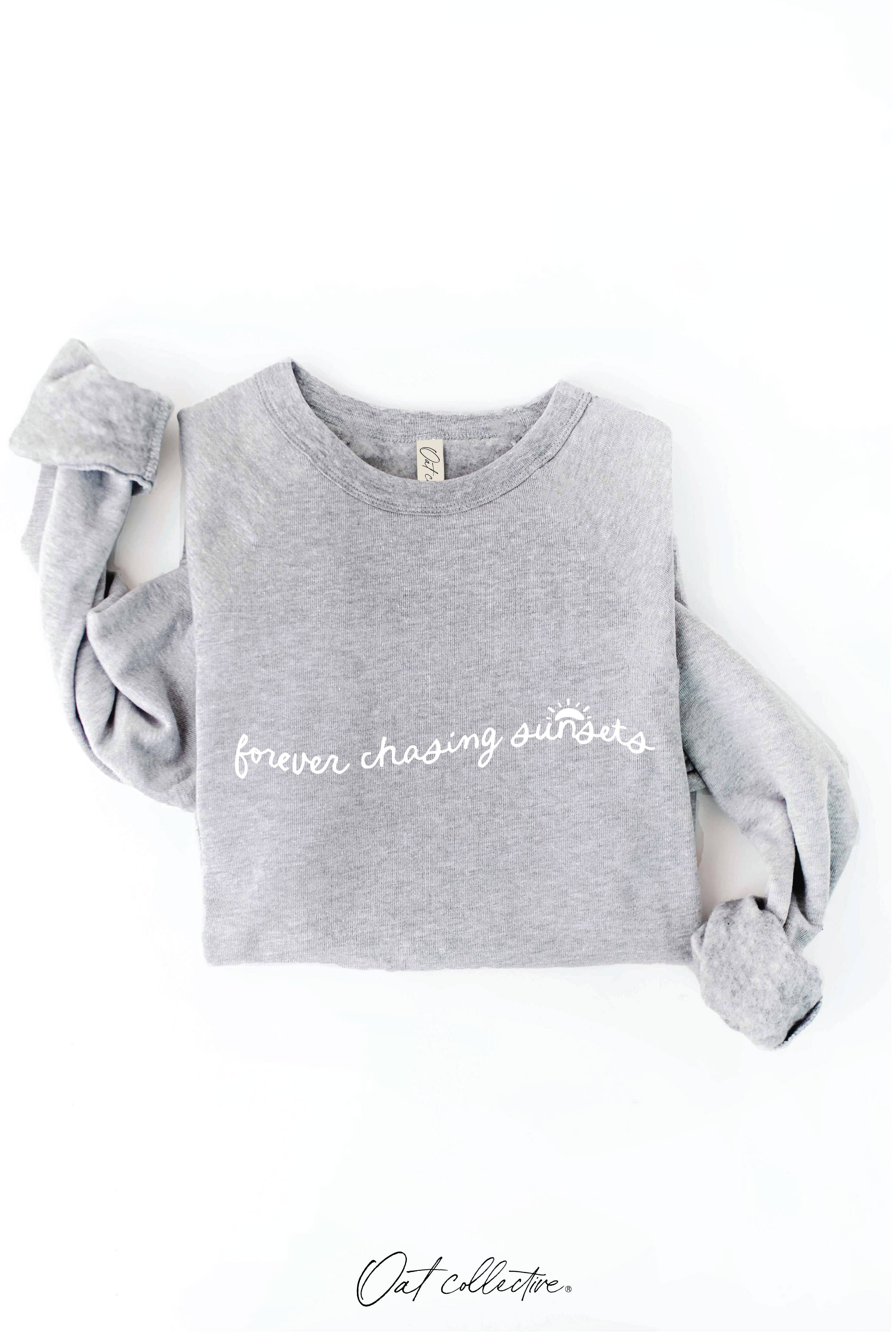 FOREVER CHASING SUNSETS Graphic Sweatshirt: relaxed fit, cream color, crew neckline, long sleeves, ribbed hem and cuffs