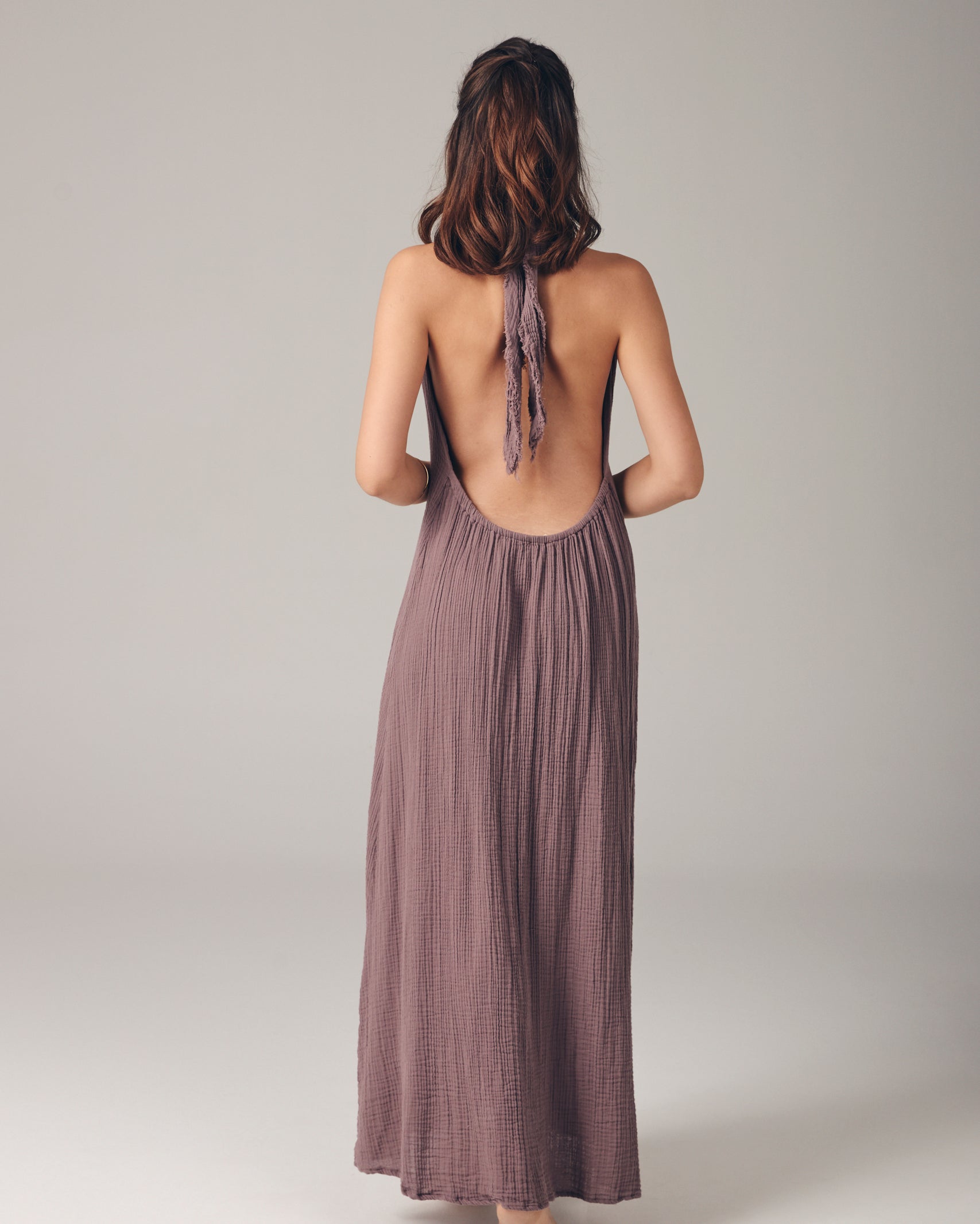 Meryem Dress: sleeveless, fitted bodice with square neckline, midi length, straight hem