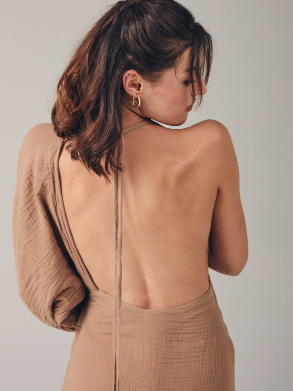 Sofia Dress: sleeveless, cream-colored midi dress with square neckline and straight hem