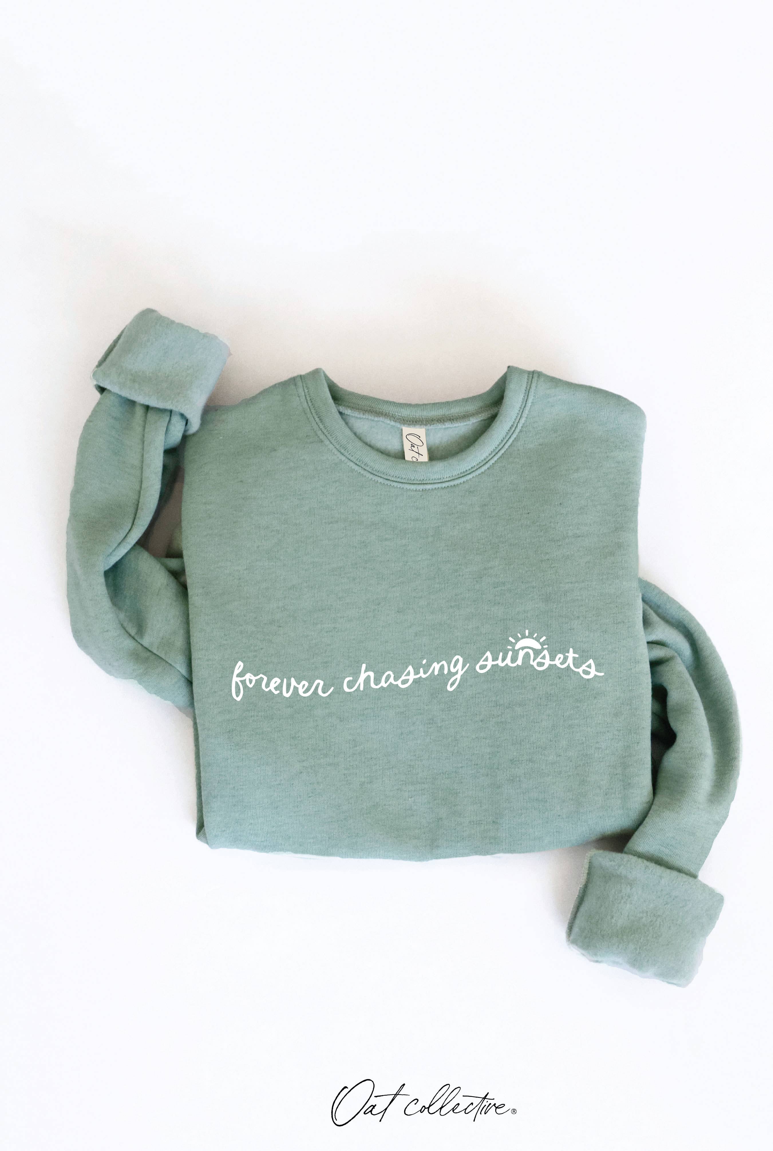 FOREVER CHASING SUNSETS Graphic Sweatshirt: oversized beige sweatshirt with crew neckline and dropped shoulders