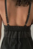 Eva Maxi Dress: sleeveless black maxi dress with deep V-neckline and gathered waist detail