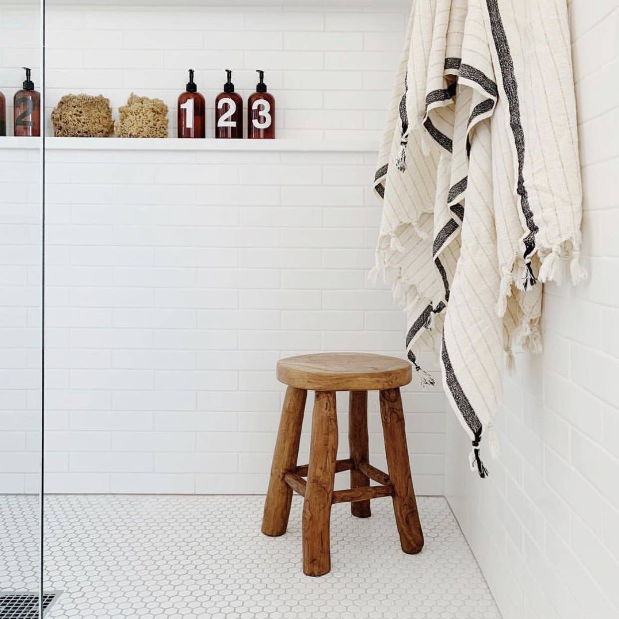 Silvia 100% Cotton Turkish Bath Towel: rectangular towel in cream with textured waffle weave and tassel edges