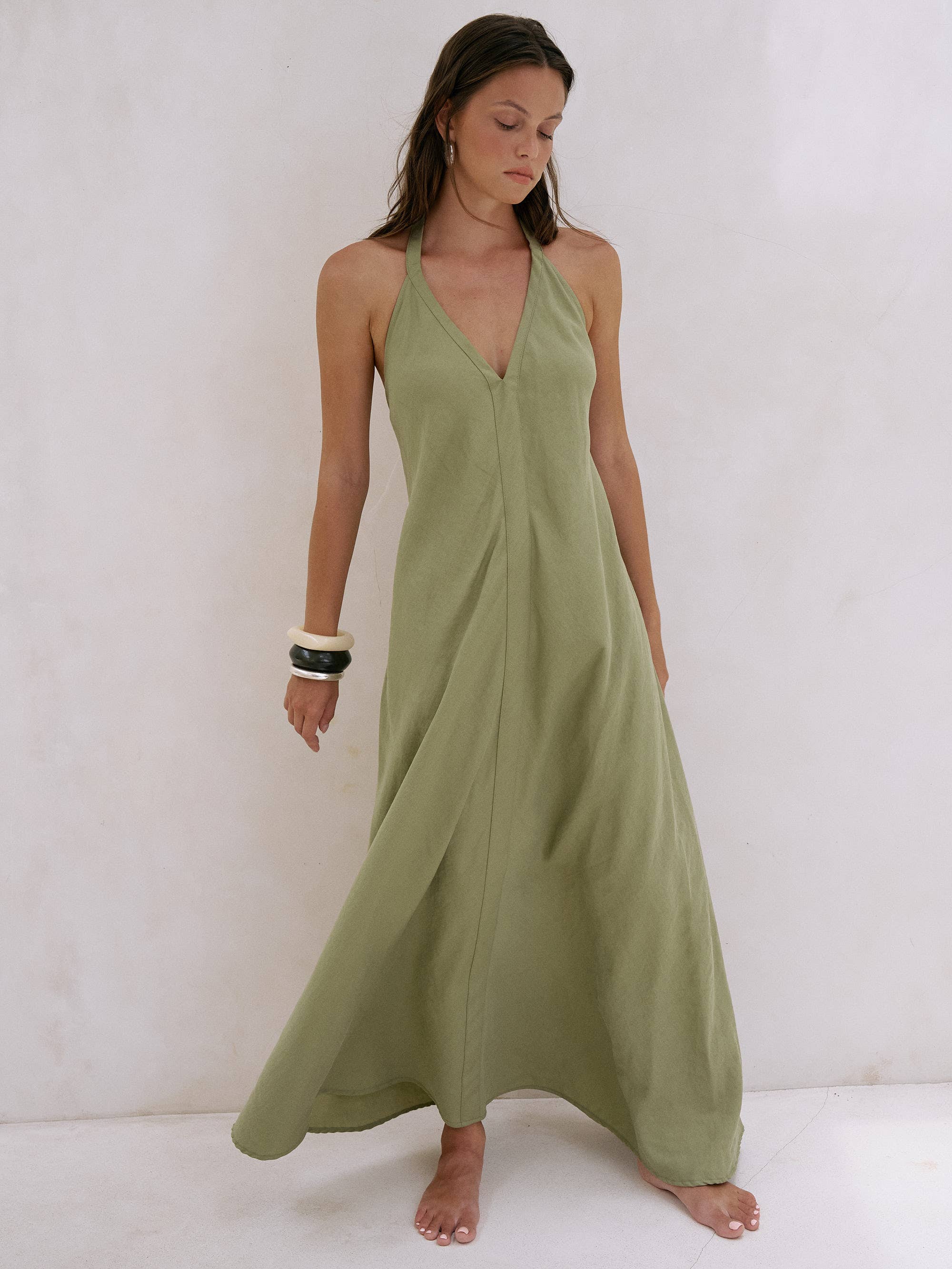 Zoe Maxi Dress - Khaki Green: sleeveless maxi dress with V-neckline, relaxed fit, and flowing hem