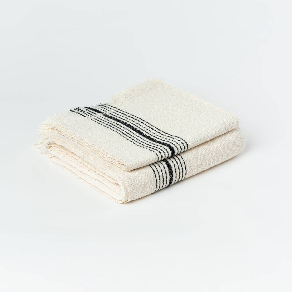Zebrine 100% Cotton Turkish Hand and Bath Towel: rectangular towel with black and white striped pattern and fringed edges