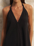 Zoe Maxi Dress: sleeveless black dress with square neckline, fitted bodice, and flowing ankle-length hem