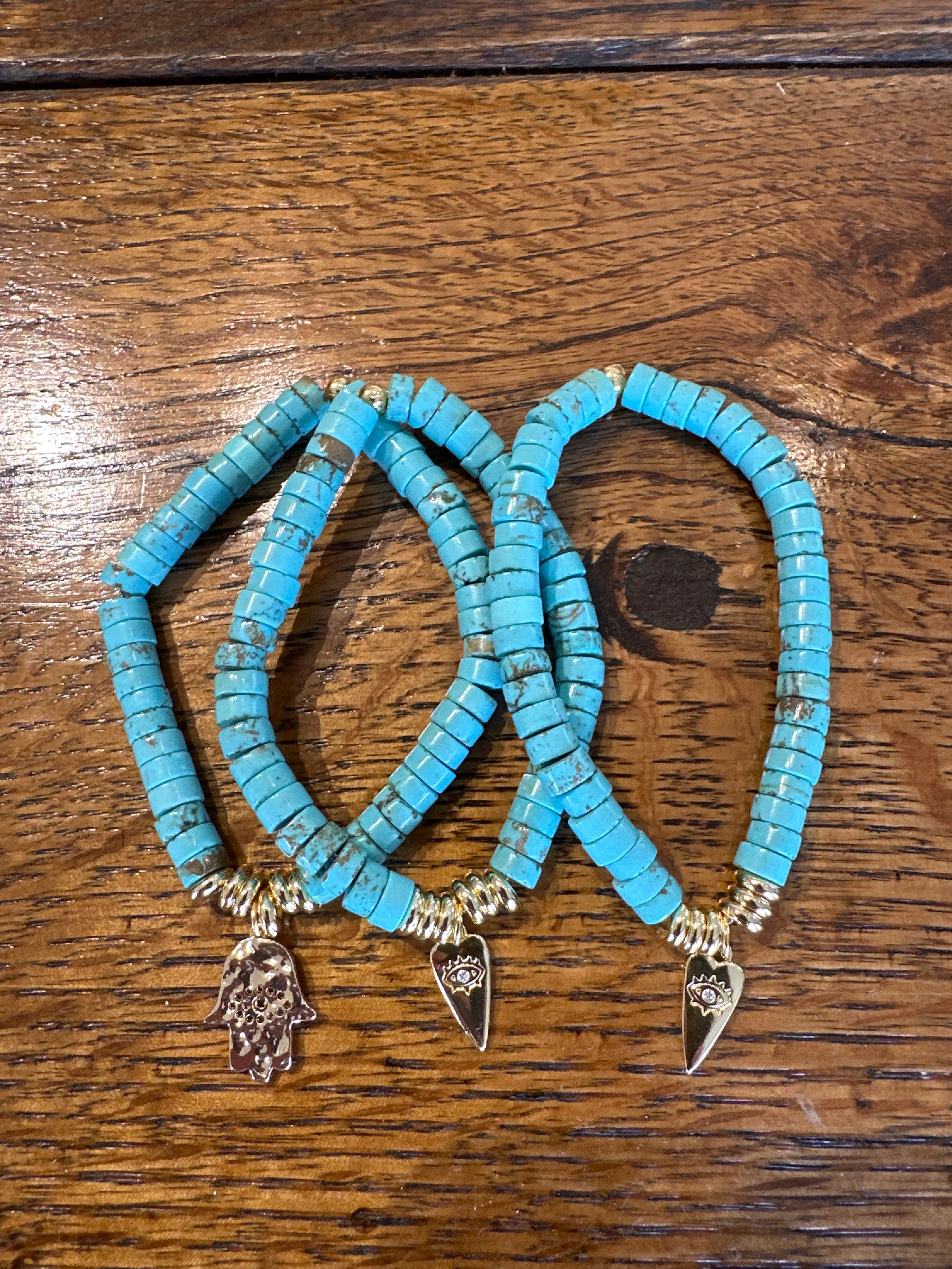 Turquoise good fortune bracelets: beaded bracelets with round turquoise stones and gold spacer beads