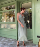 Artemisia Dress: sleeveless midi dress in beige with fitted bodice and straight hem