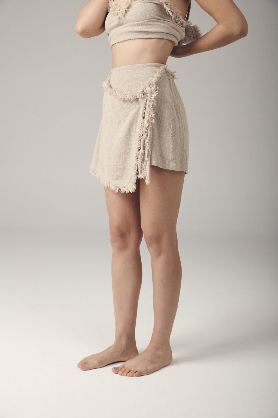 Boho skort: white A-line skort with high waist and front pleated panel details
