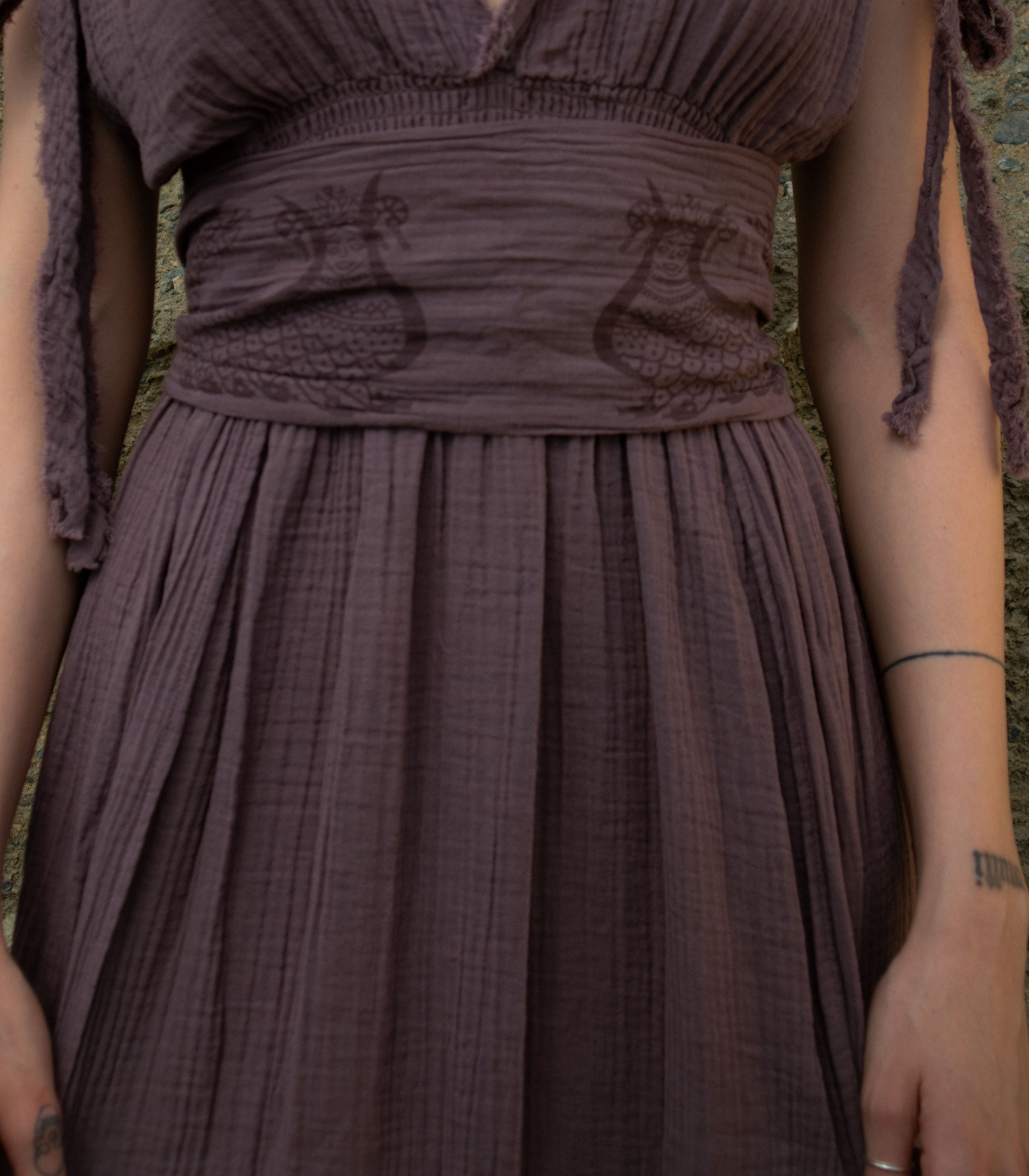 Shahmaran Dress: sleeveless midi dress with square neckline, fitted bodice, and flared skirt