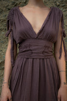 Shahmaran Dress: sleeveless midi dress with square neckline, fitted bodice, and flared skirt