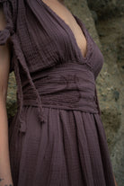 Shahmaran Dress: sleeveless, fitted midi dress in rust color with square neckline and side slit