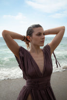 Shahmaran Dress: sleeveless midi dress with square neckline, fitted bodice, flared hem, white color