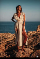 Shahmaran Dress: sleeveless black dress with scoop neckline, fitted bodice, and flared midi skirt