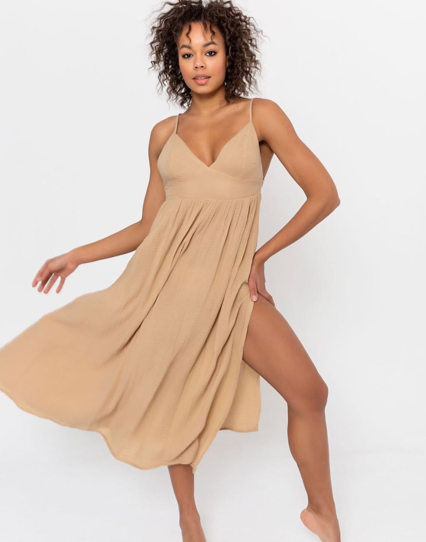 Lydia Dress: sleeveless beige dress with fitted bodice, square neckline, and midi straight hem