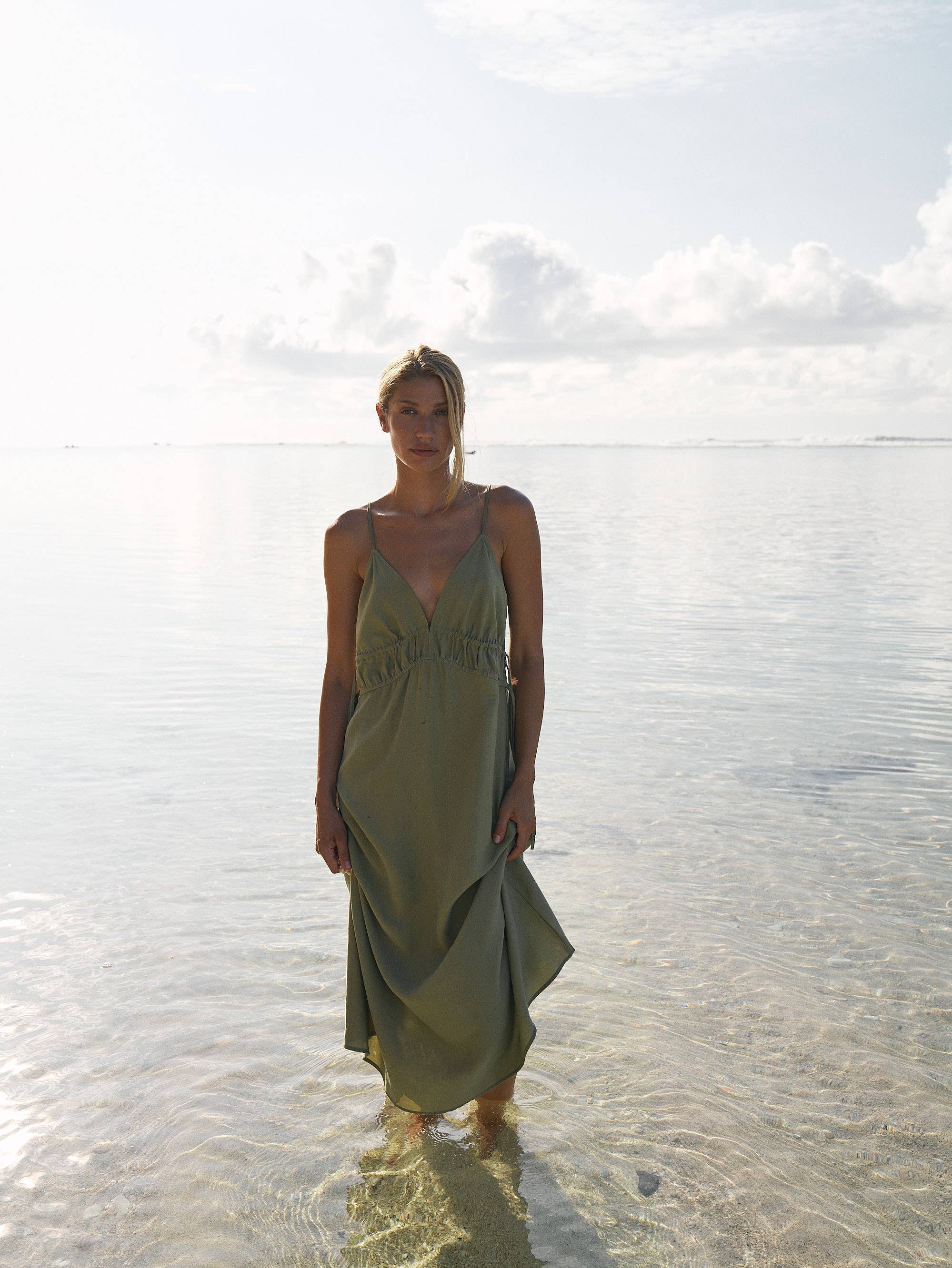 Sofia Ties Maxi Dress: sleeveless beige dress with V-neck, side ties, and flowing maxi length
