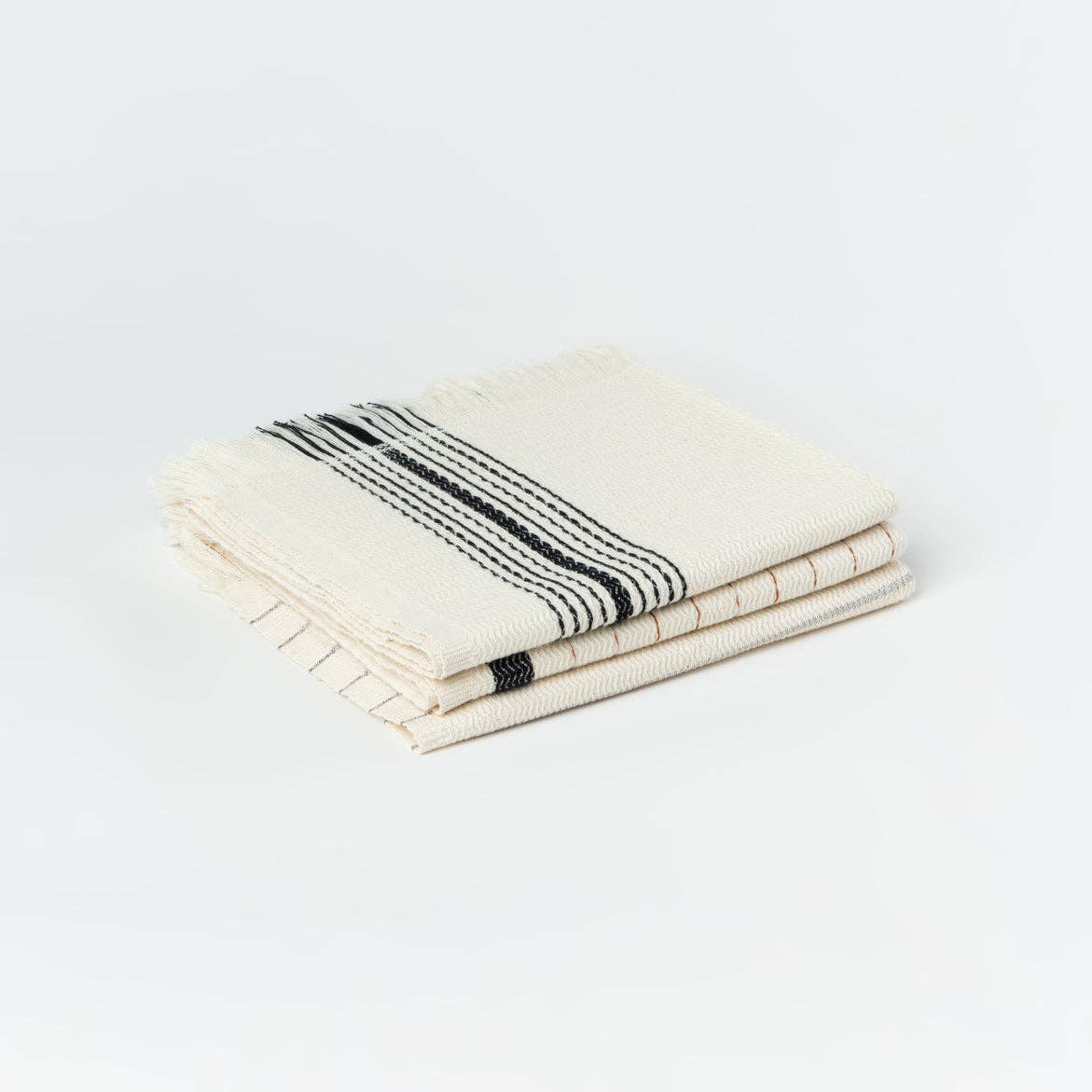 Zebrine 100% Cotton Turkish Hand and Bath Towel: rectangular beige towel with thin black striped pattern and fringed edges