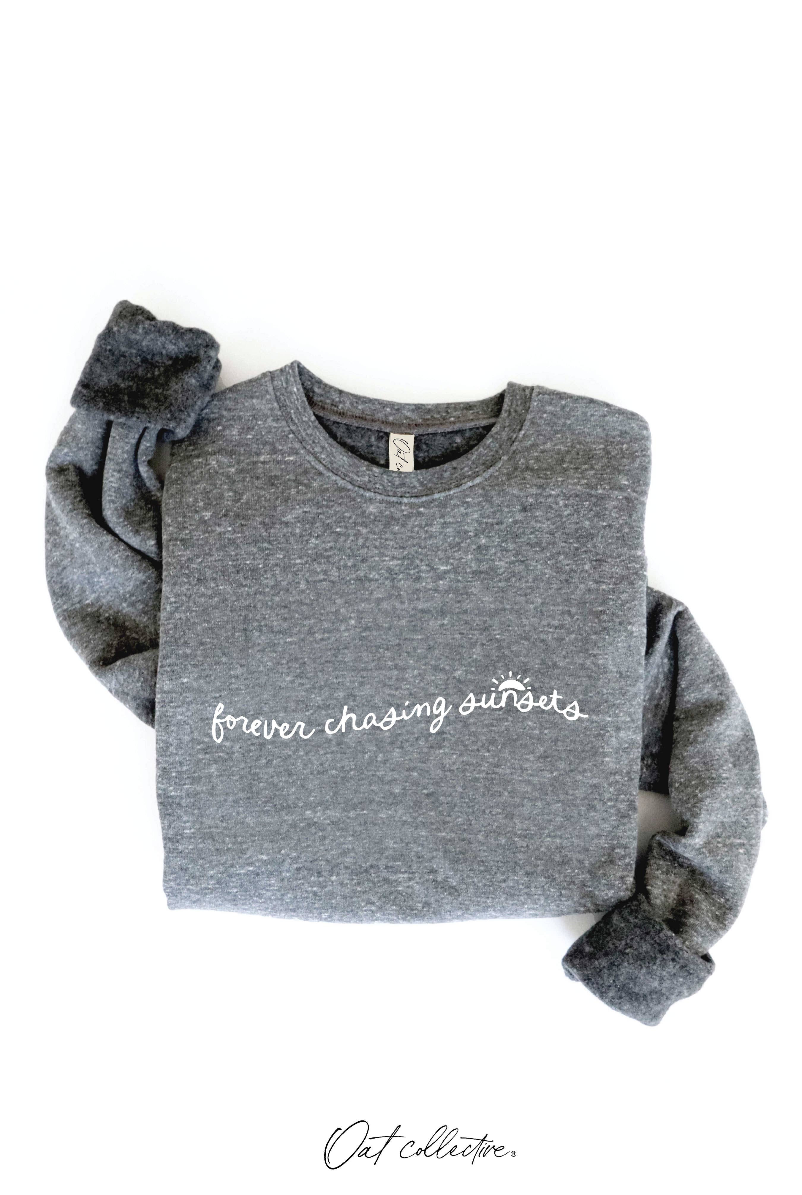 FOREVER CHASING SUNSETS Graphic Sweatshirt: relaxed fit, white crew neck, long sleeves, ribbed cuffs and hem