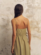 Sofia Ties Maxi Dress: sleeveless, navy blue, V-neck, fitted bodice, flowing ankle-length skirt
