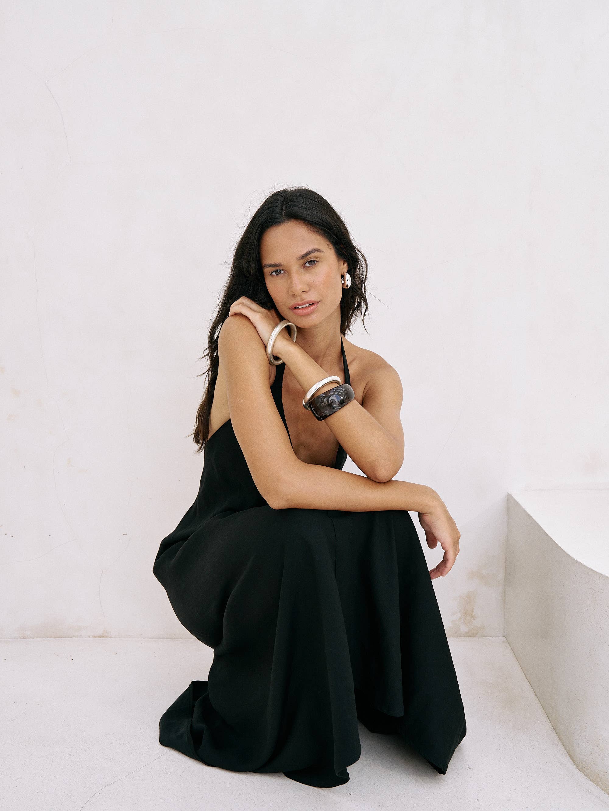 Zoe Maxi Dress: sleeveless white dress with square neckline, fitted bodice, and flowing ankle-length skirt