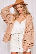Crochet Balloon Sleeve Cardigan: black fitted crochet cardigan with V-neck, balloon sleeves, and cropped hem