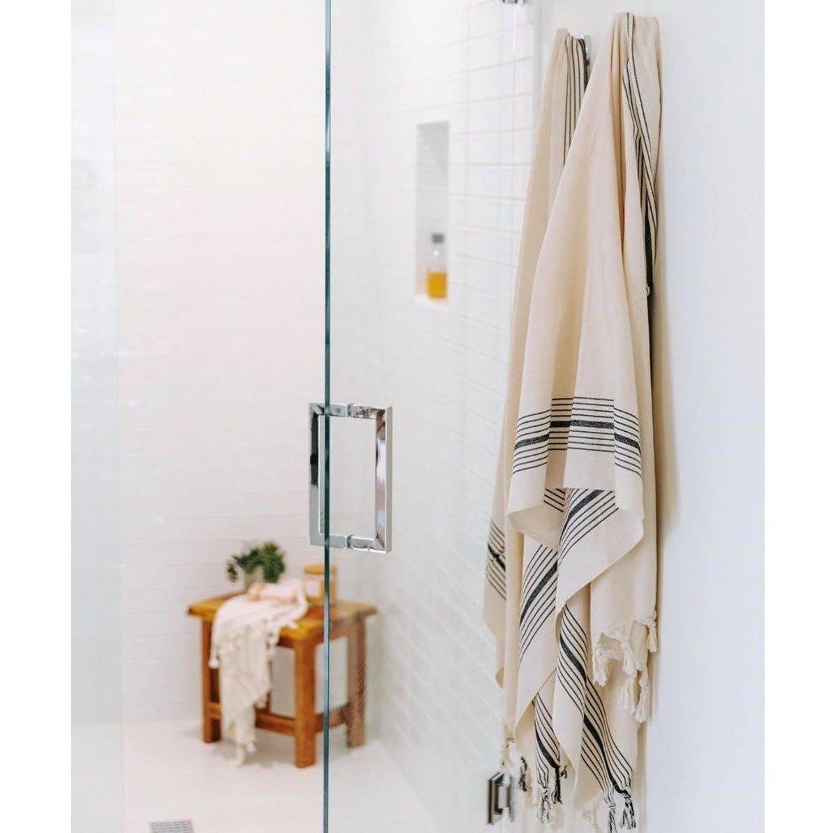 Zebrine 100% Cotton Turkish Hand and Bath Towel: rectangular towel with black and off-white zebra stripes and fringed edges