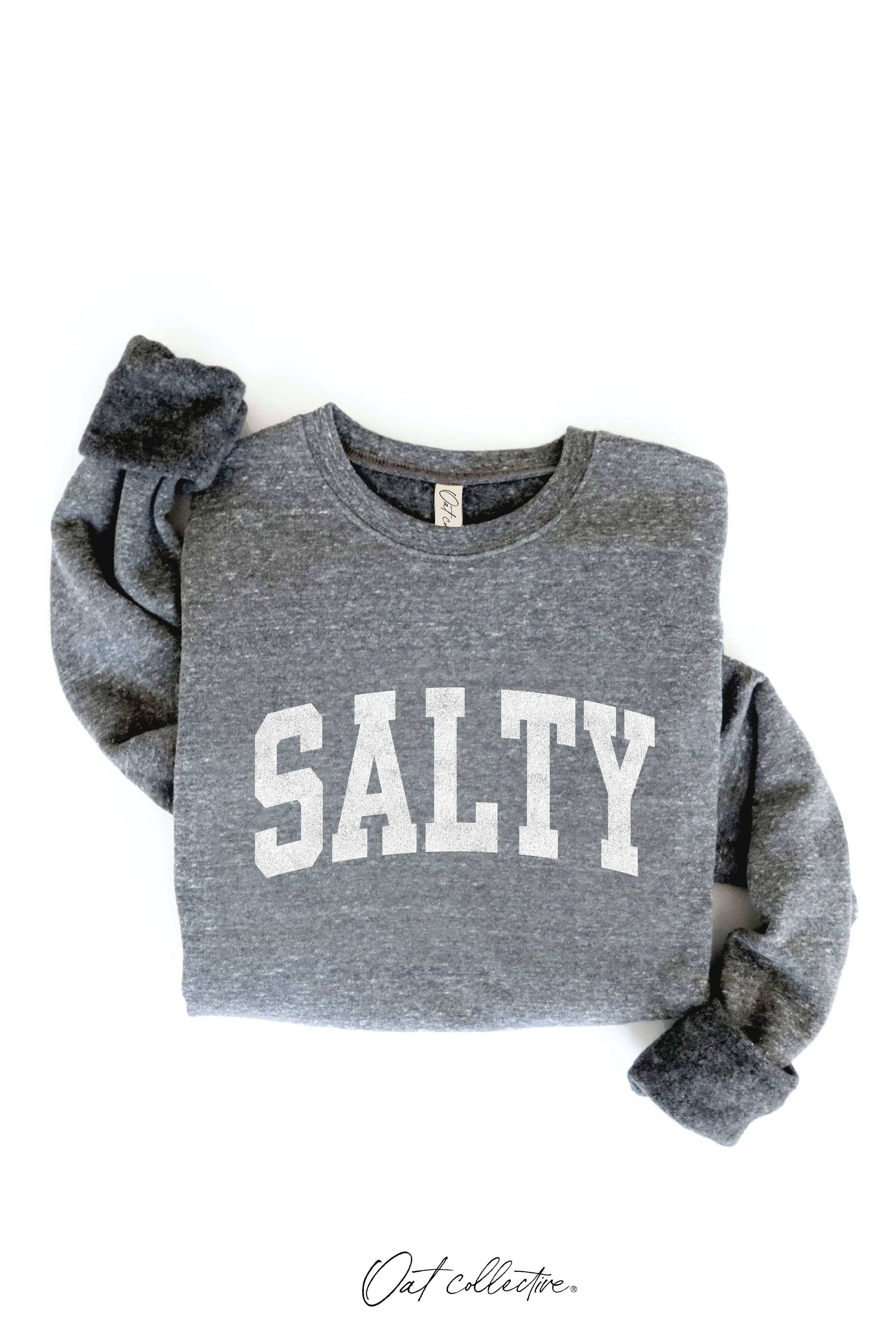 SALTY Graphic Sweatshirt: cream crew neck sweatshirt with relaxed fit, long sleeves, and ribbed cuffs and hem