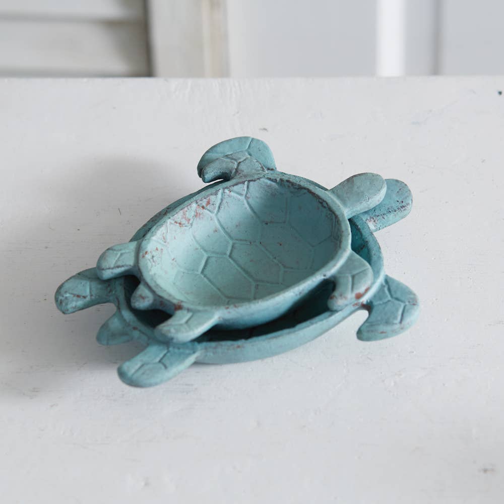 Set of Two Sea Turtle Trinket Dishes: round dishes with raised sea turtle design in green and gold tones