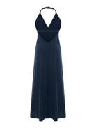 Deep navy halter maxi dress, flat lay, deep V-neckline, center seam bodice, A-line skirt with natural slub texture, single neck button, floor-length hem.