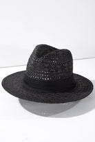 Boho Chic Summer Panama Hat: natural straw color, rounded crown, wide flat brim.