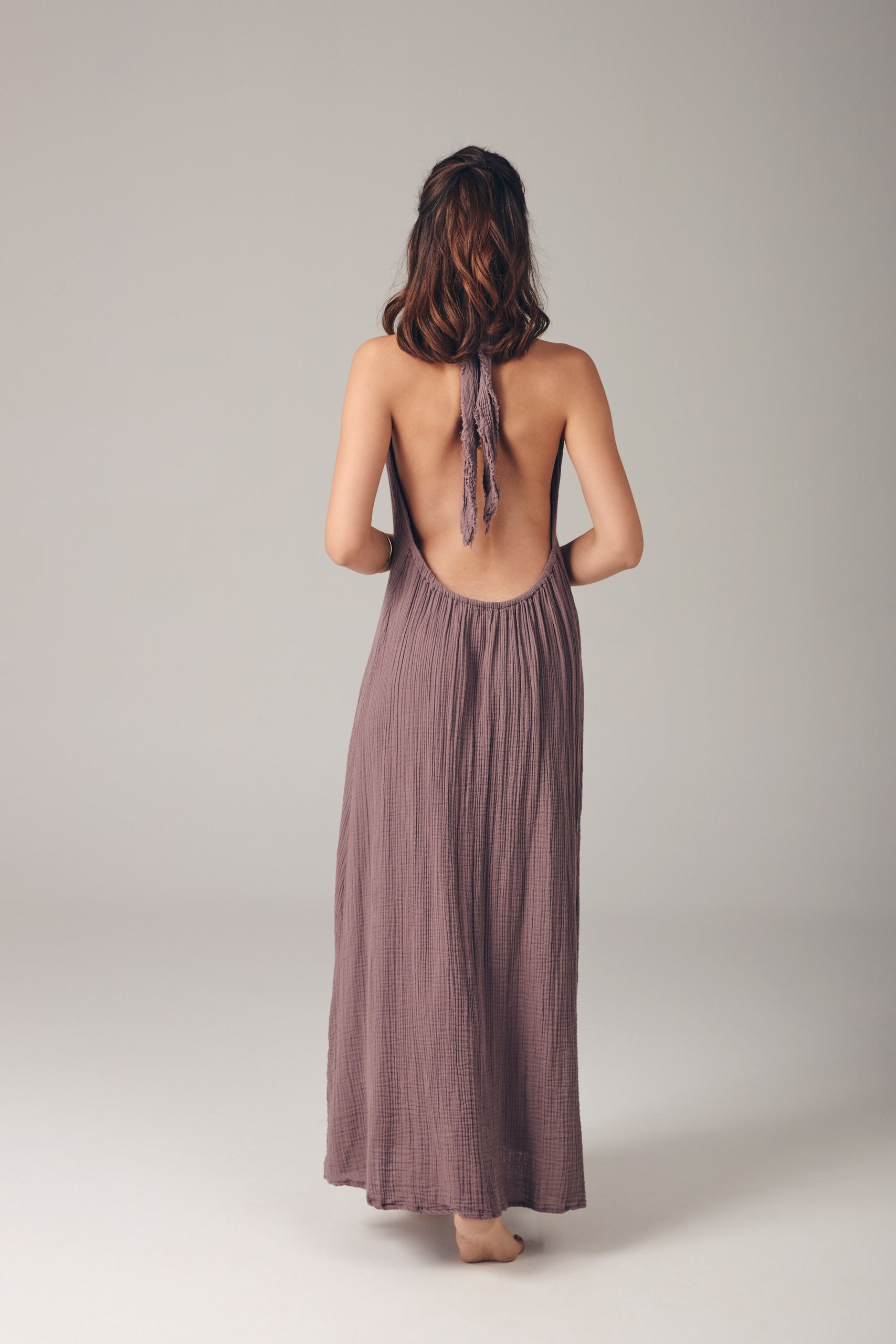 Meryem Dress: sleeveless, fitted bodice with square neckline, midi length, straight hem