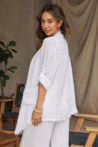 Coastal Drape Linen Cardigan: relaxed fit, open front, long sleeves, lapel collar, mid-thigh length, beige linen