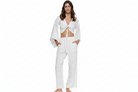 Cropped tie-front cotton top with dramatic wide bell sleeves and raw fringe trim, paired with matching