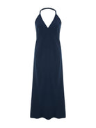 Navy halter maxi dress flat lay, deep V-neckline, center front seam, A-line silhouette, open back with single neck strap, slub-textured fabric, floor-length hem