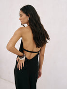 Zoe Maxi Dress: sleeveless, V-neck, dark blue dress with fitted bodice and flowing ankle-length hem