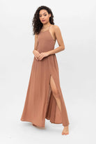 Bella Dress: sleeveless ivory midi dress with square neckline, fitted bodice, and straight hem