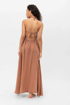 Bella Dress: sleeveless black midi dress with fitted bodice, square neckline, and straight hem