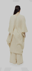 Ege Kimono: loose fit, mid-length, open front, long wide sleeves, light beige fabric