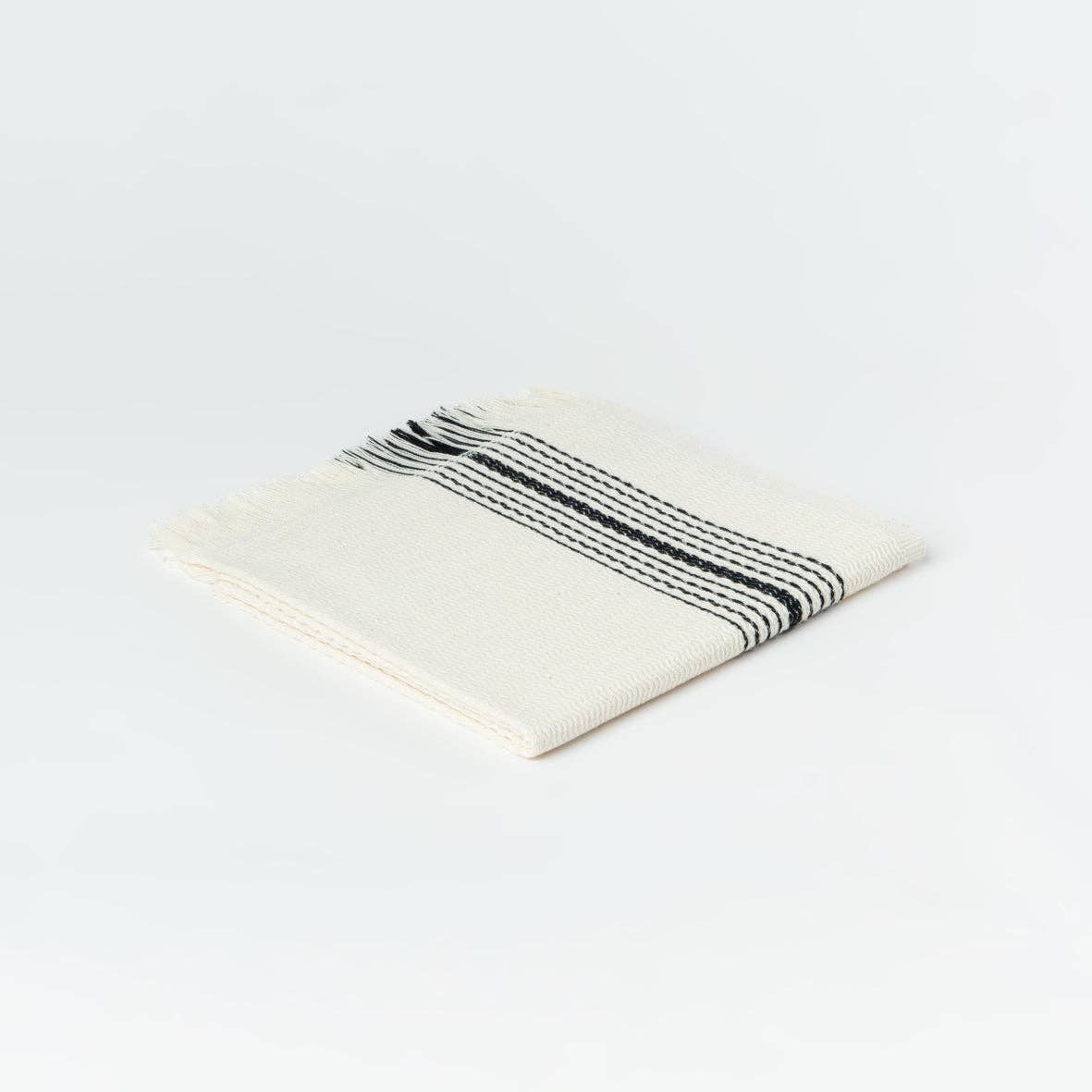 Zebrine 100% Cotton Turkish Hand and Bath Towel: rectangular towel with black and white striped pattern and fringed edges