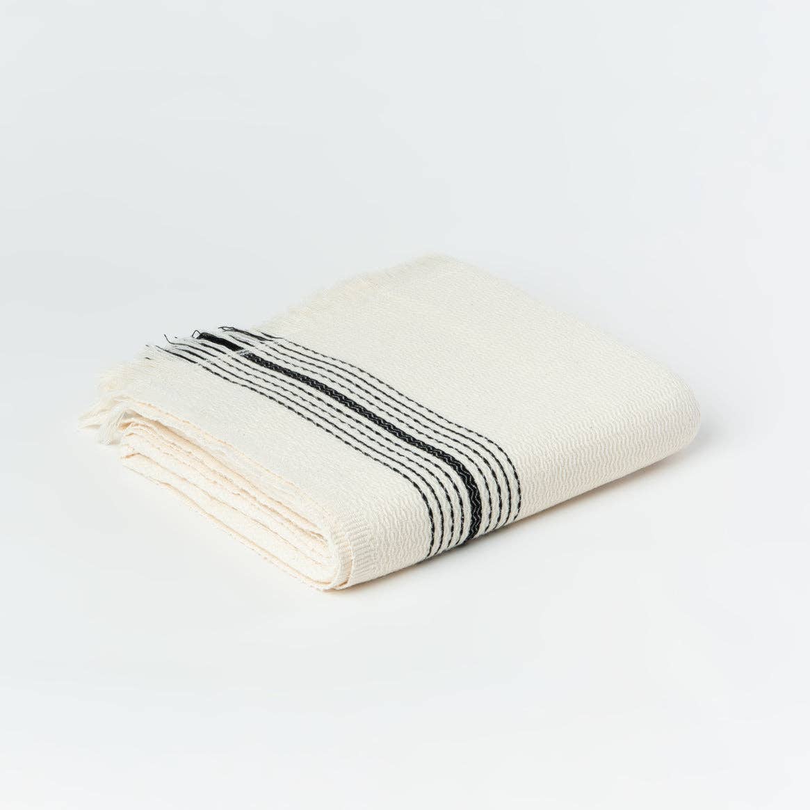 Zebrine 100% Cotton Turkish Hand and Bath Towel: rectangular towel with ivory and dark brown zebra stripe pattern, fringed edges