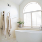 Silvia 100% Cotton Turkish Bath Towel: rectangular towel in cream with navy blue stripes and fringed edges