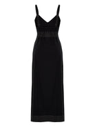 Eva Maxi Dress: sleeveless beige dress with V-neckline, fitted waist, and flowing ankle-length hem