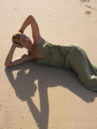 Sofia Ties Maxi Dress: sleeveless white maxi dress with square neckline, fitted bodice, and flowing skirt