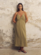 Sofia Ties Maxi Dress: sleeveless, V-neck, beige dress with fitted bodice and flowing ankle-length skirt